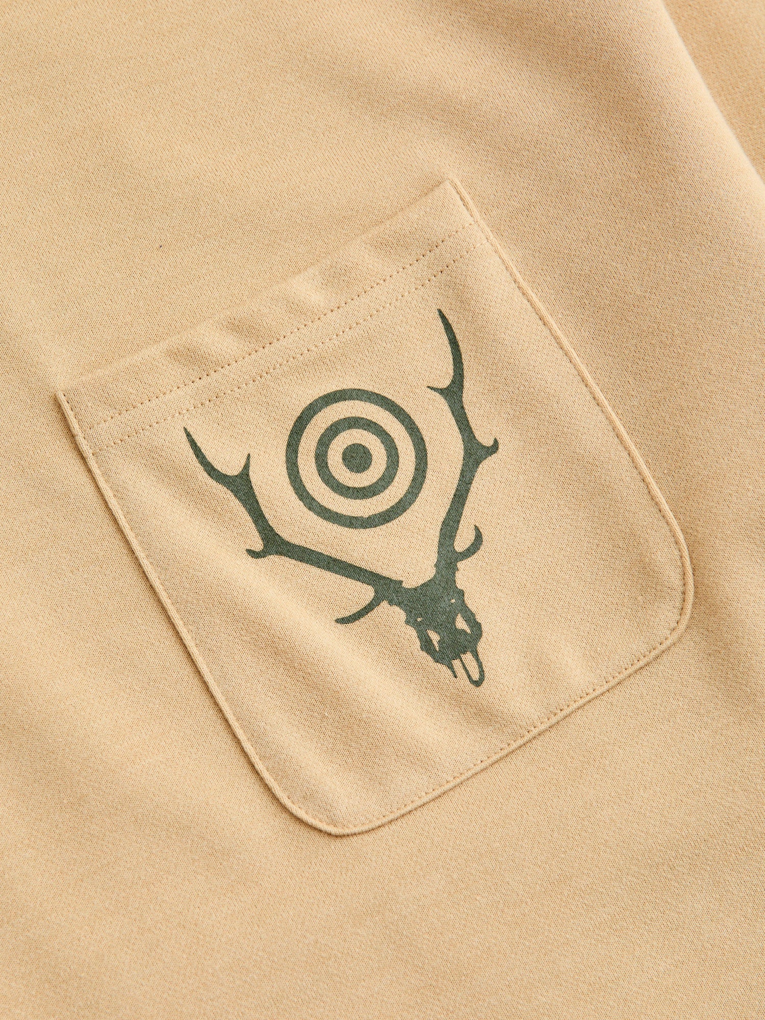 Circle Horn Round Pocket T-Shirt in Beige - Image 5