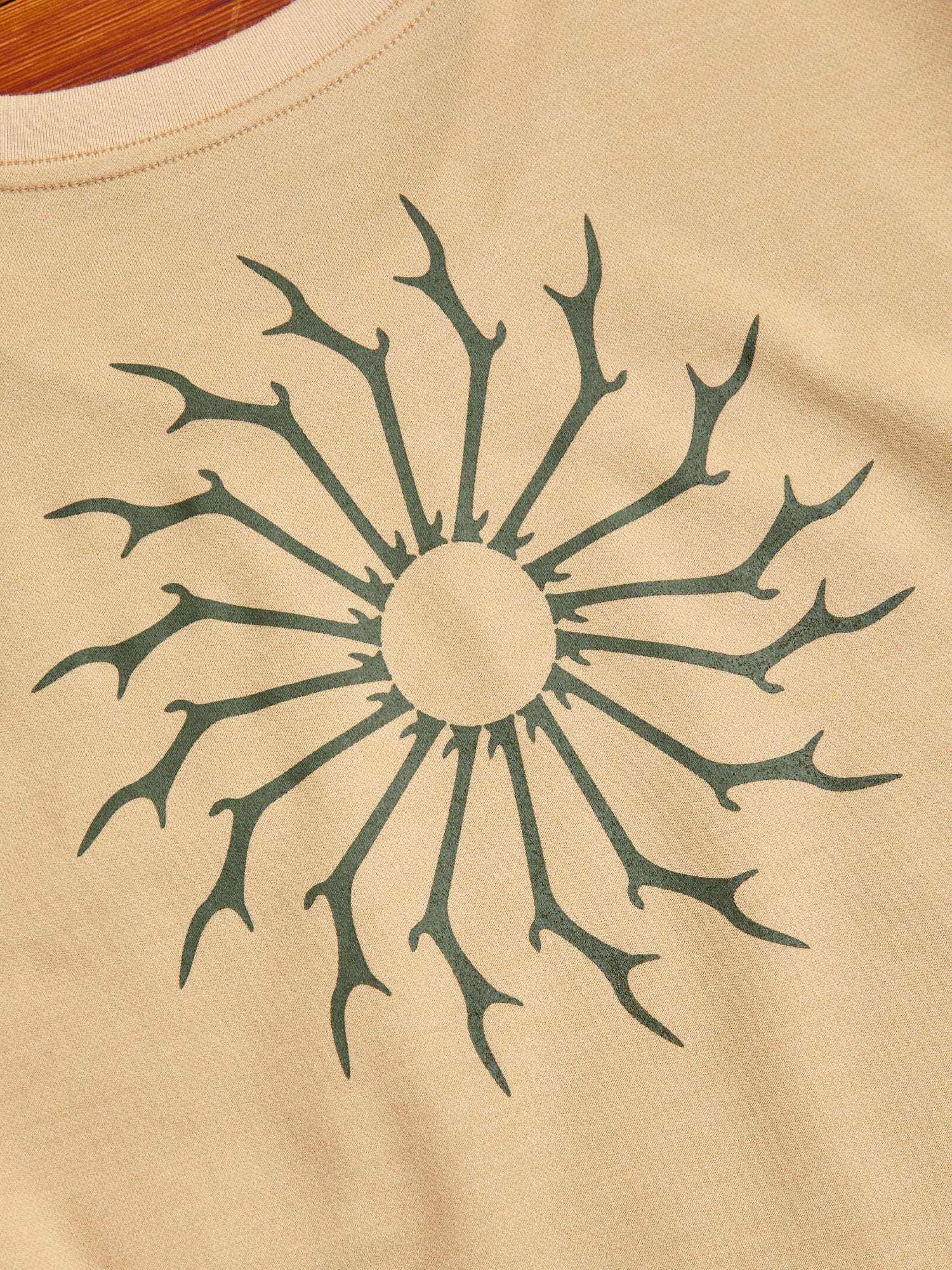 Circle Horn Round Pocket T-Shirt in Beige - Image 9