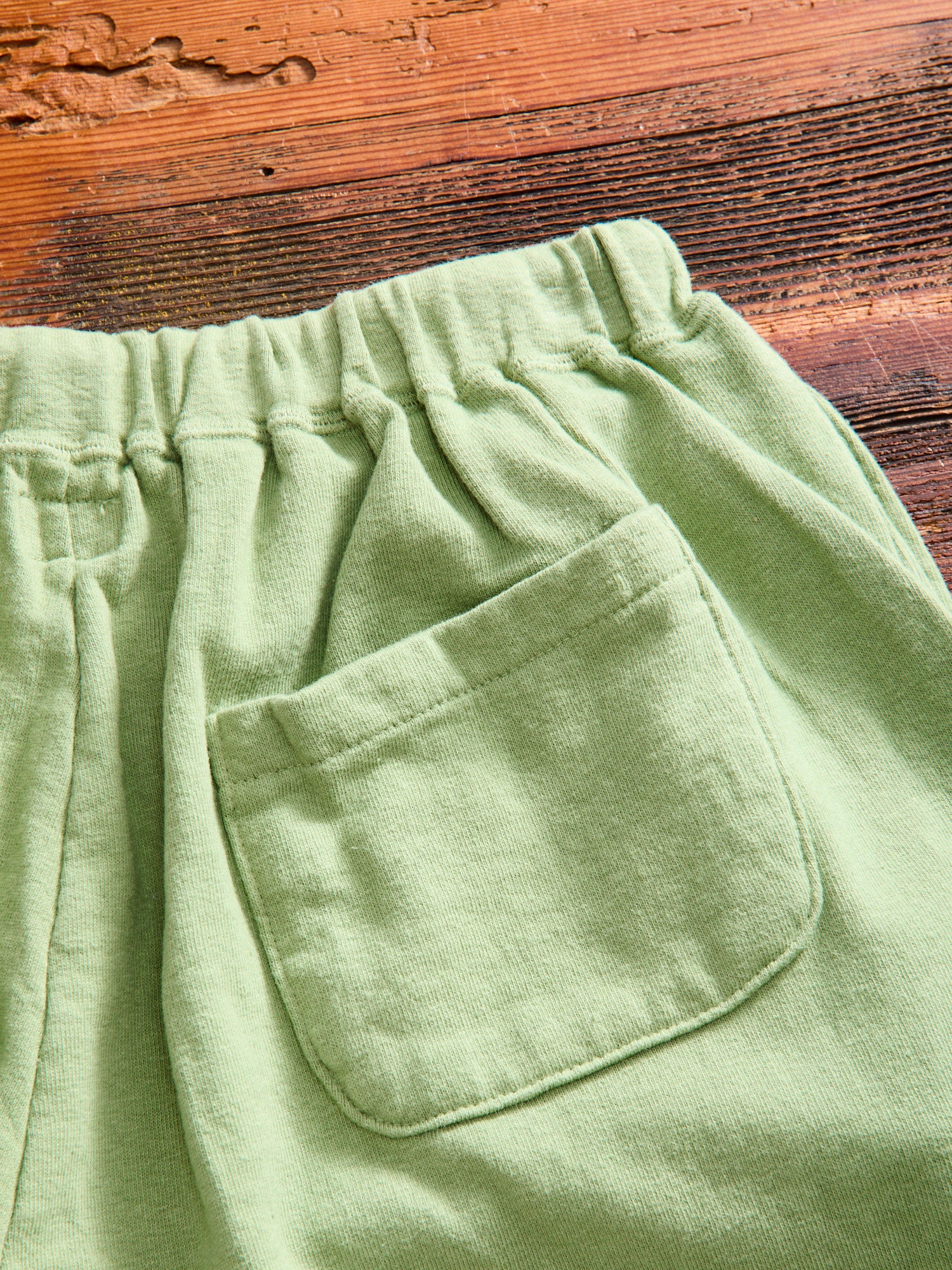 Lightweight Cutoff Sweatshort in Tea Green - Image 6